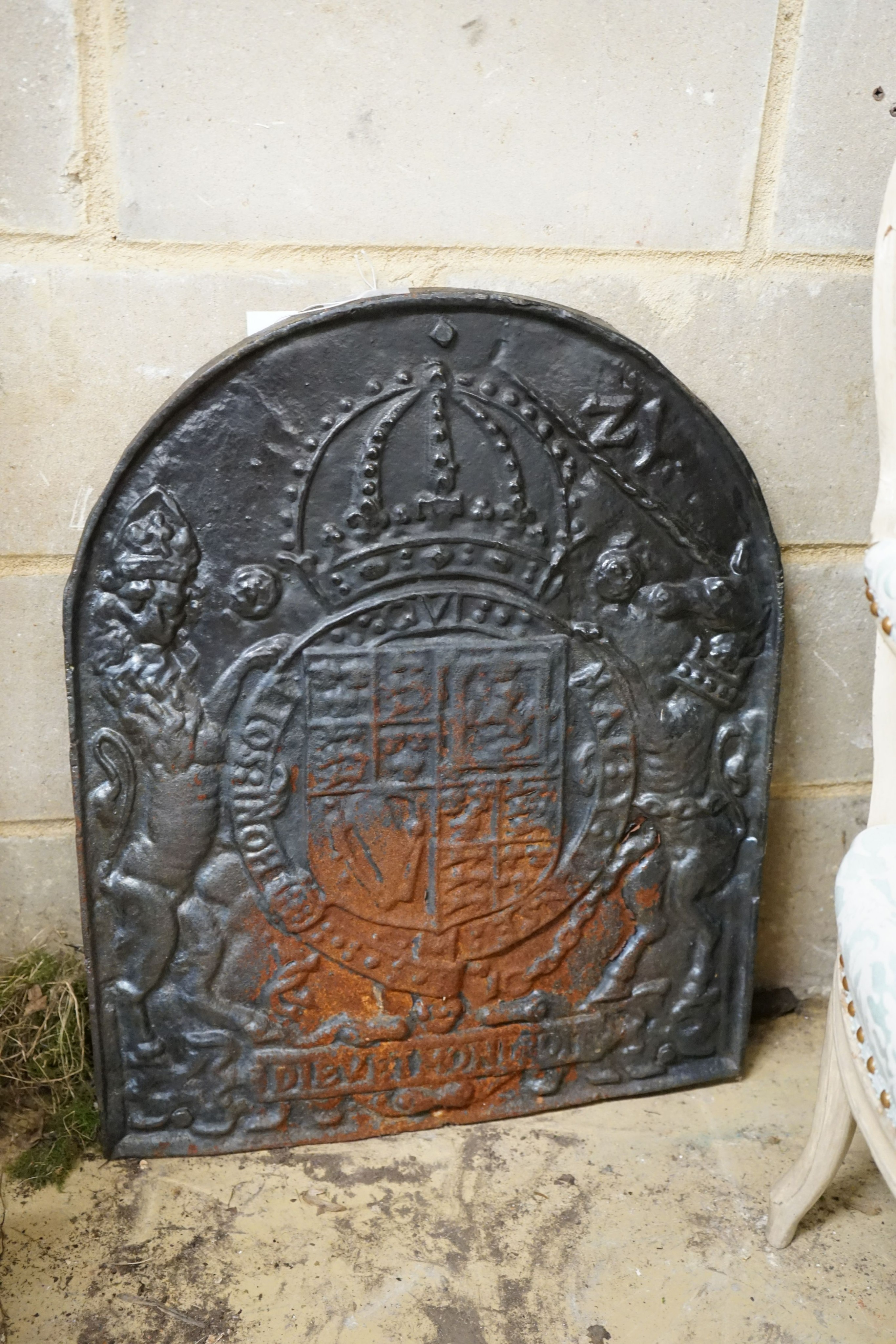 A cast iron fireback, width 55cm, height 68cm